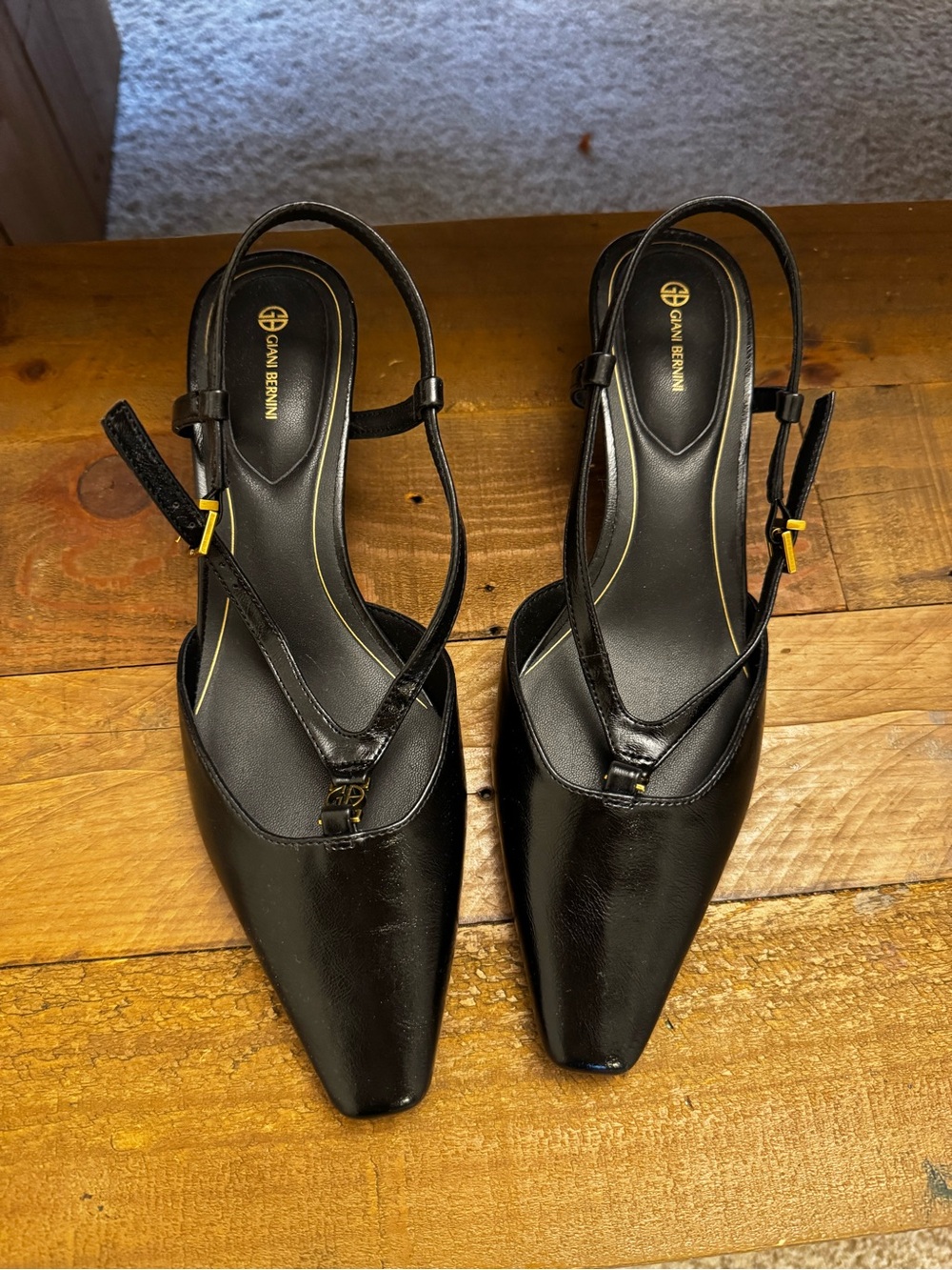 Giani Bernini Black Pointed Slingback Leather Mules with Gold Accents